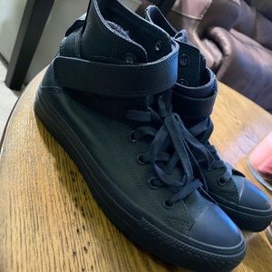 All navy leather converse with strap